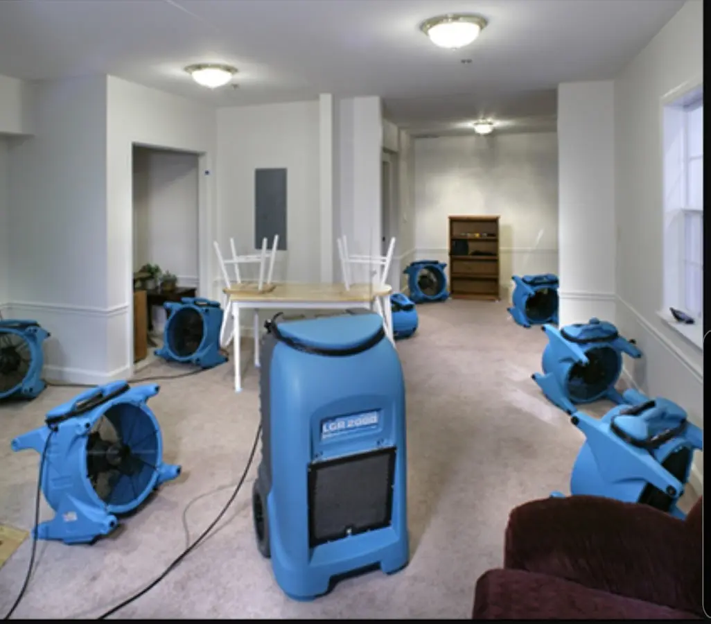 Air movers and dehumidifier setup for Water Damage Restoration in The Colony